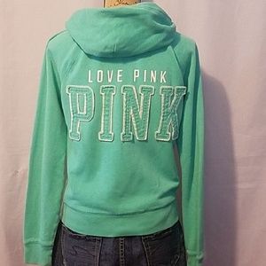 Pink Vicroria's secret zip up jacket.